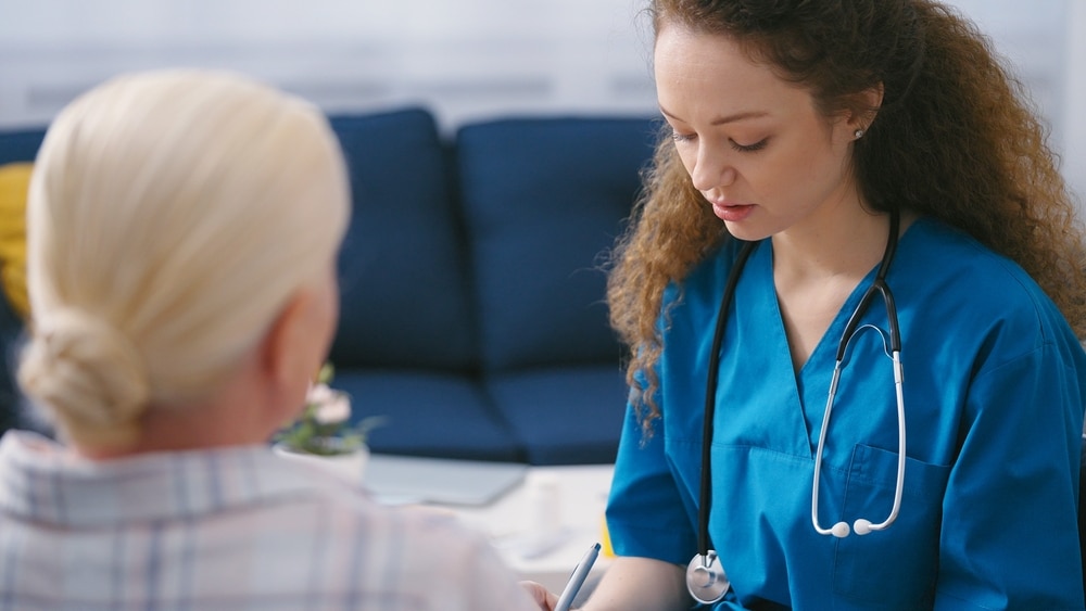 Skilled,Practitioner,Listening,To,Mature,Woman’s,Complains,And,Making,Prescription